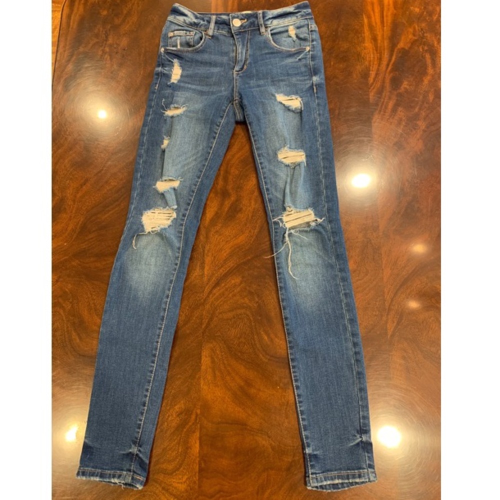 Blue ripped high waisted fitted jeans